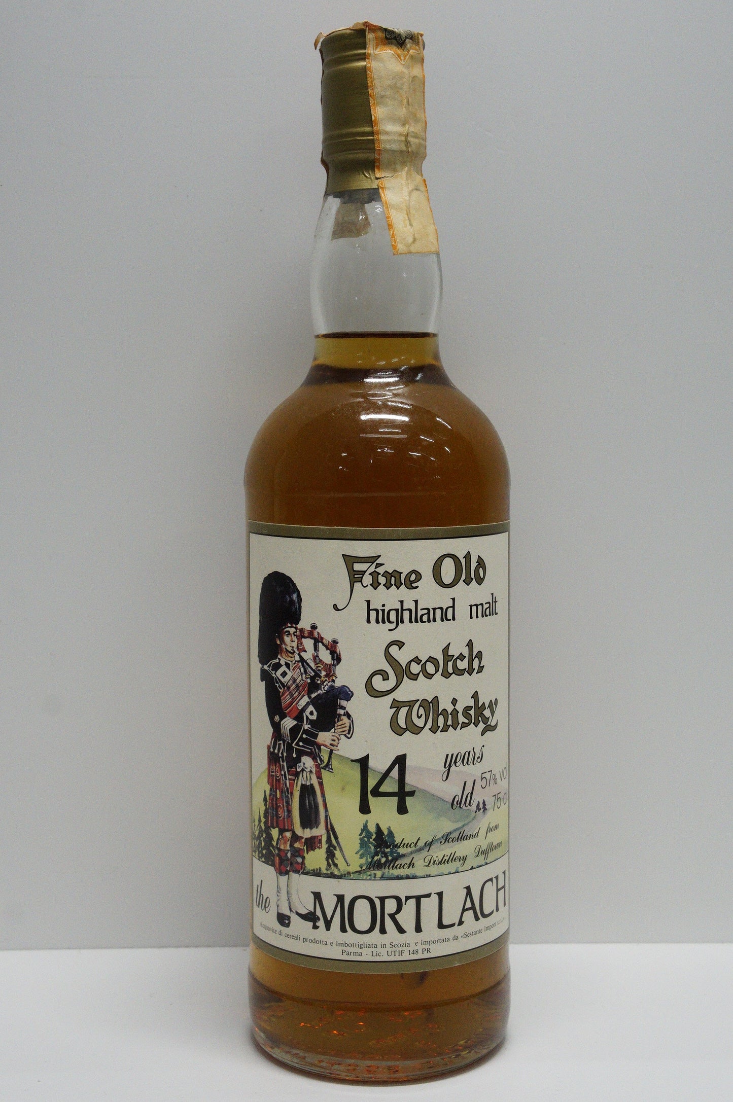 MORTLACH - SINGLE MALT - IB - SESTANTE "FINE OLD HIGHLAND MALT" PIPER LABEL 14YO